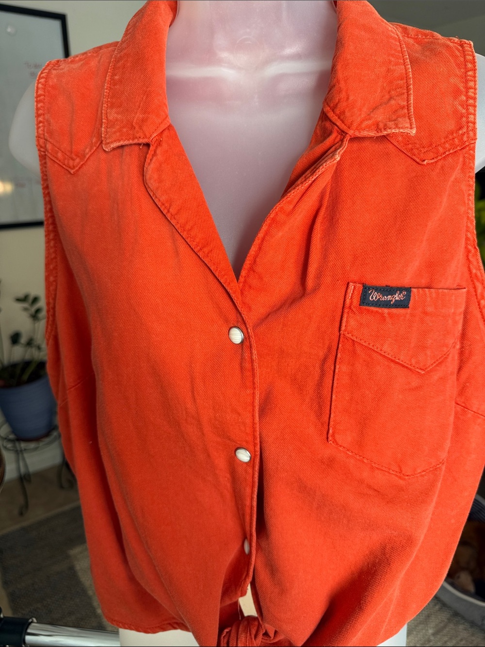Wrangler sleeveless button-down top in a warm burnt orange/rust color